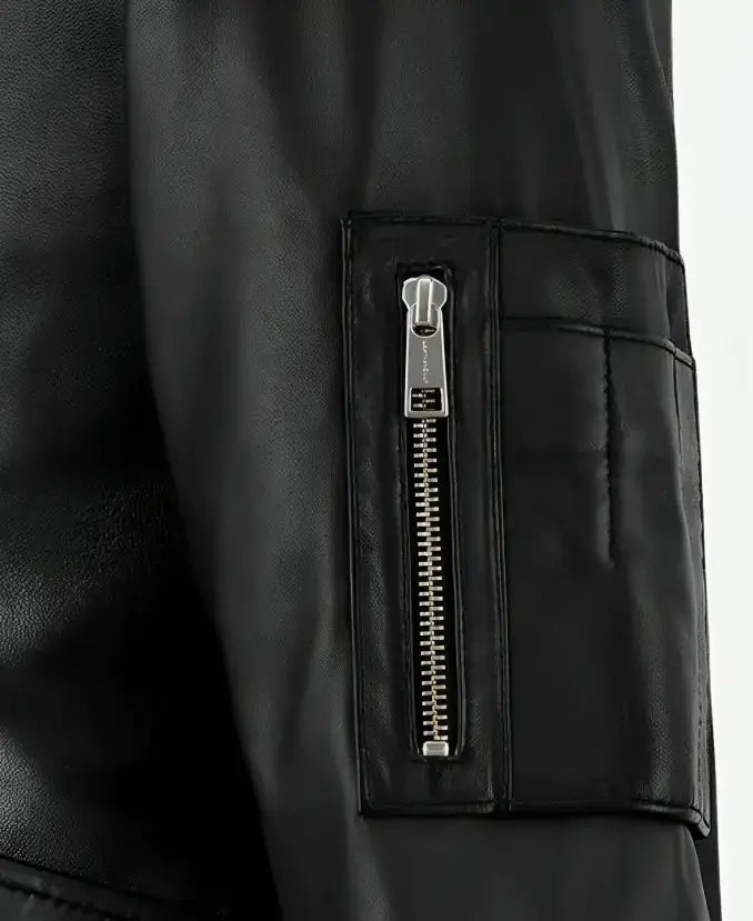 Black leather jacket with full-length sleeves and zipper closure, inspired by rapper Eminem's iconic style.