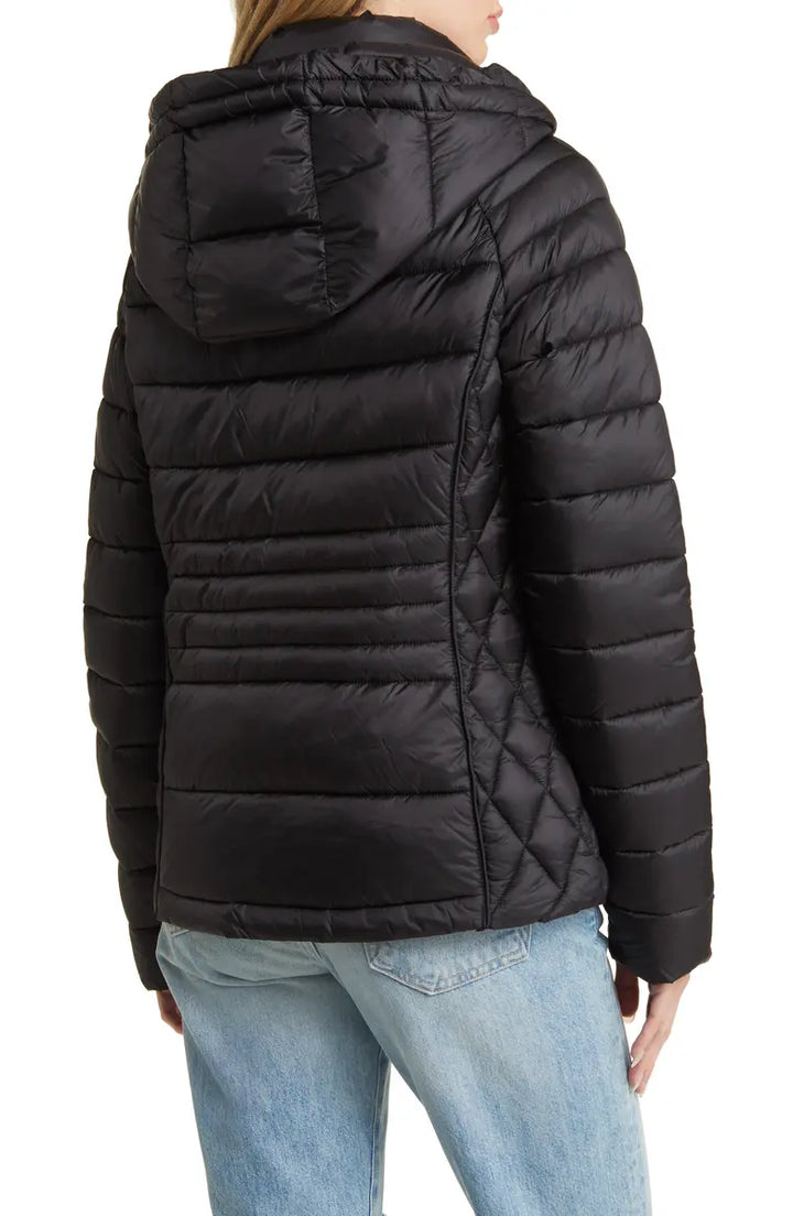 Close-up of Women Lightweight Hooded Puffer Jacket texture in USA