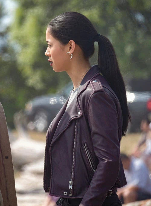 Sleek black leather jacket worn by Leah Lewis in Nancy Drew in United State Market